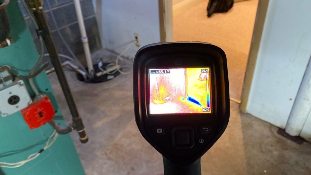Thermal imaging camera detecting high levels of moisture after water damage